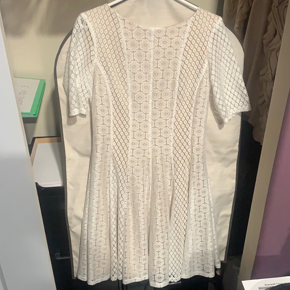 Danny and Nicole white sleeved dress